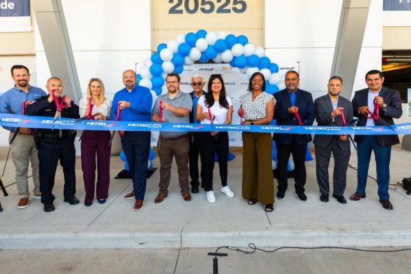 Santiago Osorio (far right) attends Missouri City Park & Ride ribbon cutting ceremony.